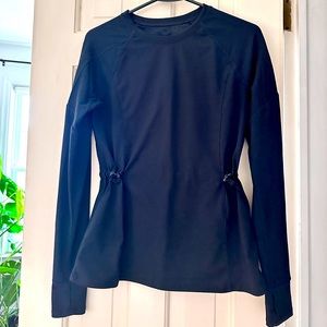 Cute Fablectics athletic shirt with adjustable fit. Size Small